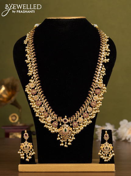 Antique guttapusalu haaram lakshmi & peacock design with kemp & cz stones and pearl hangings