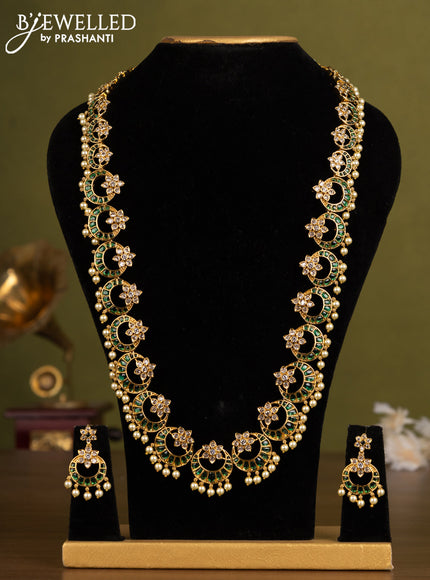 Antique guttapusalu haaram chandbali design with green kemp & cz stones and pearl hangings