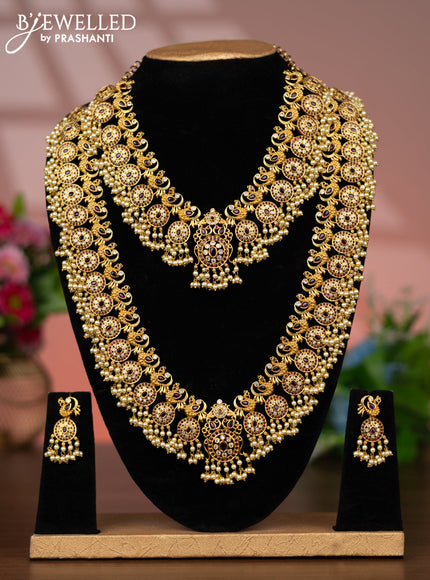 Antique guttapusalu combo set peacock design with pink kemp & cz stones and pearl hangings
