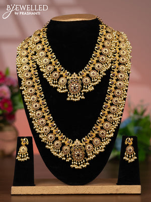 Antique guttapusalu combo set peacock design with pink kemp & cz stones and pearl hangings