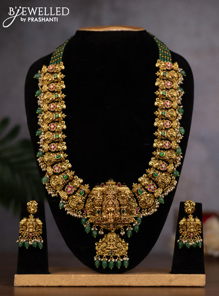 Antique haaram lakshmi design with kemp & kundan stones and green beads hanging