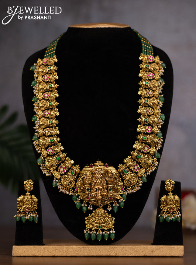 Antique haaram lakshmi design with kemp & kundan stones and green beads hanging