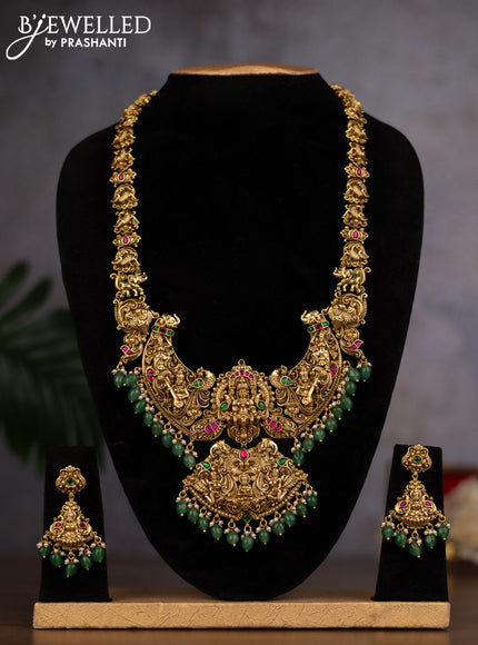 Antique haaram lakshmi design with jadau stones and green beads hanging