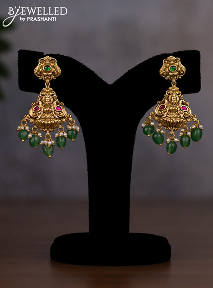 Antique haaram lakshmi design with jadau stones and green beads hanging