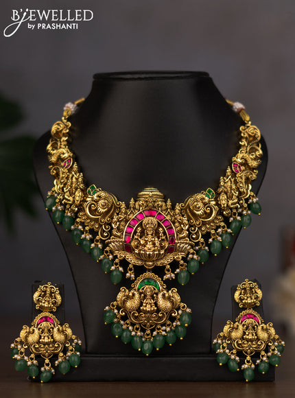 Antique necklace lakshmi design with jadau stones and green beads hanging
