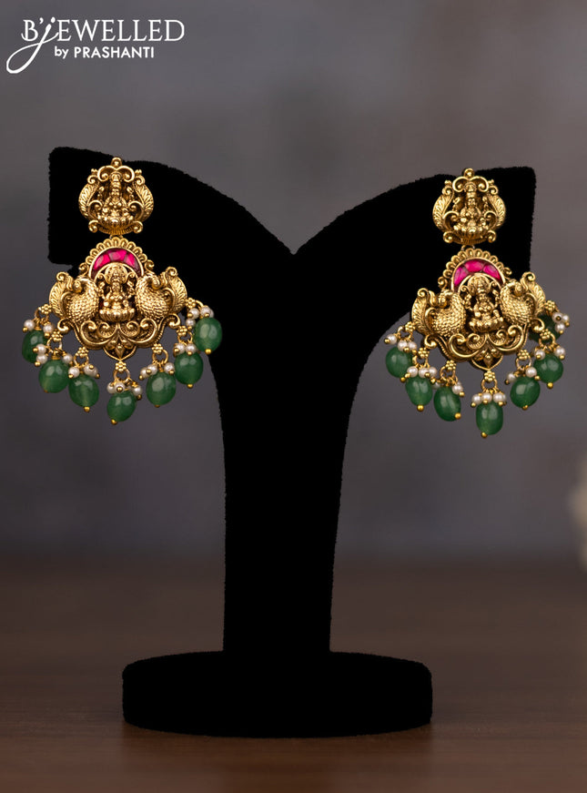 Antique necklace lakshmi design with jadau stones and green beads hanging