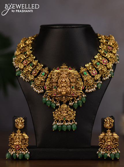 Antique necklace lakshmi design with jadau stones and green beads hanging