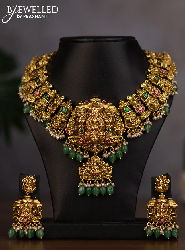 Antique necklace lakshmi design with jadau stones and green beads hanging