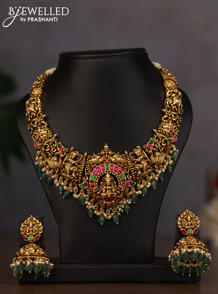 Antique necklace lakshmi design with jadau stones and green beads hanging