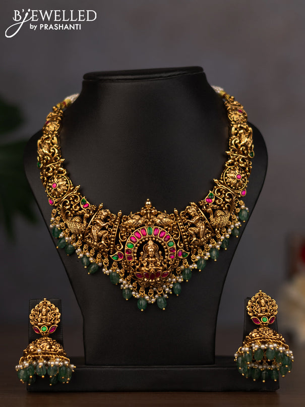 Antique necklace lakshmi design with jadau stones and green beads hanging