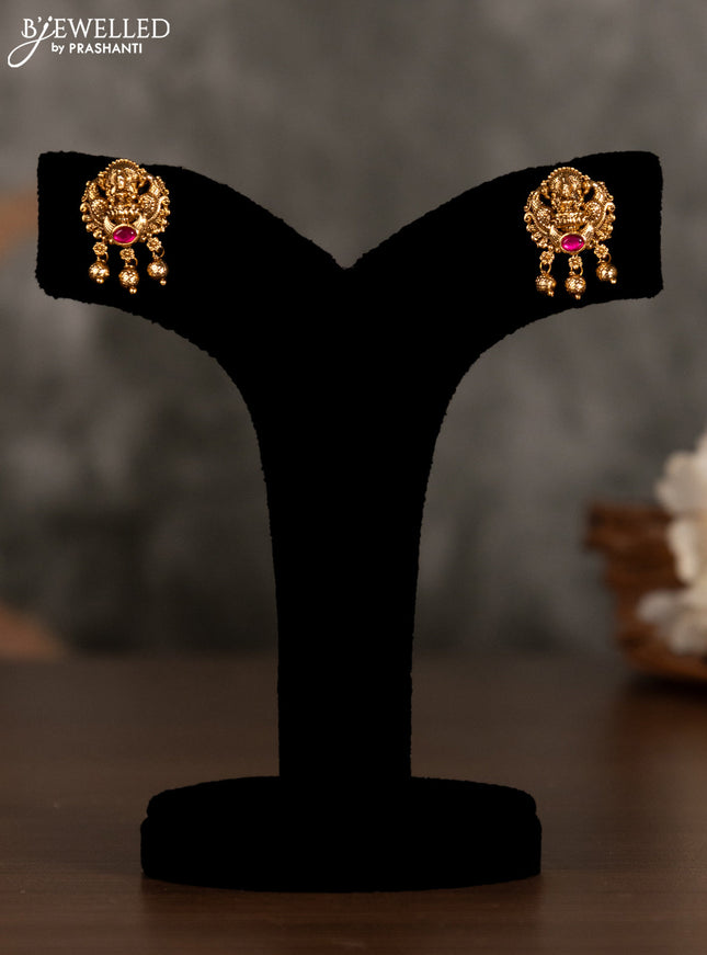 Antique pendant set lakshmi design with kemp stones and golden beads hanging