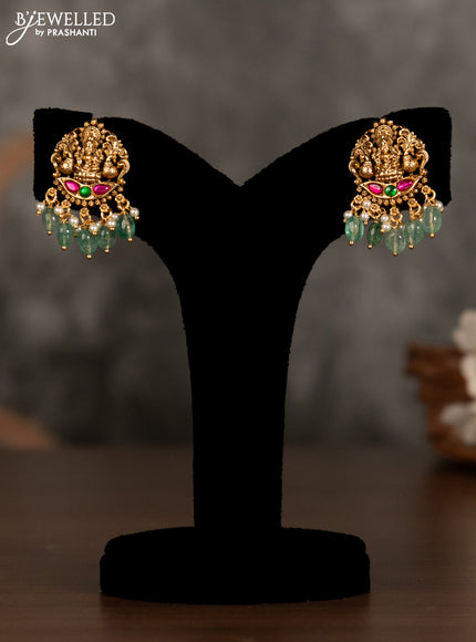 Antique pendant set lakshmi design with kemp stones and green beads hanging