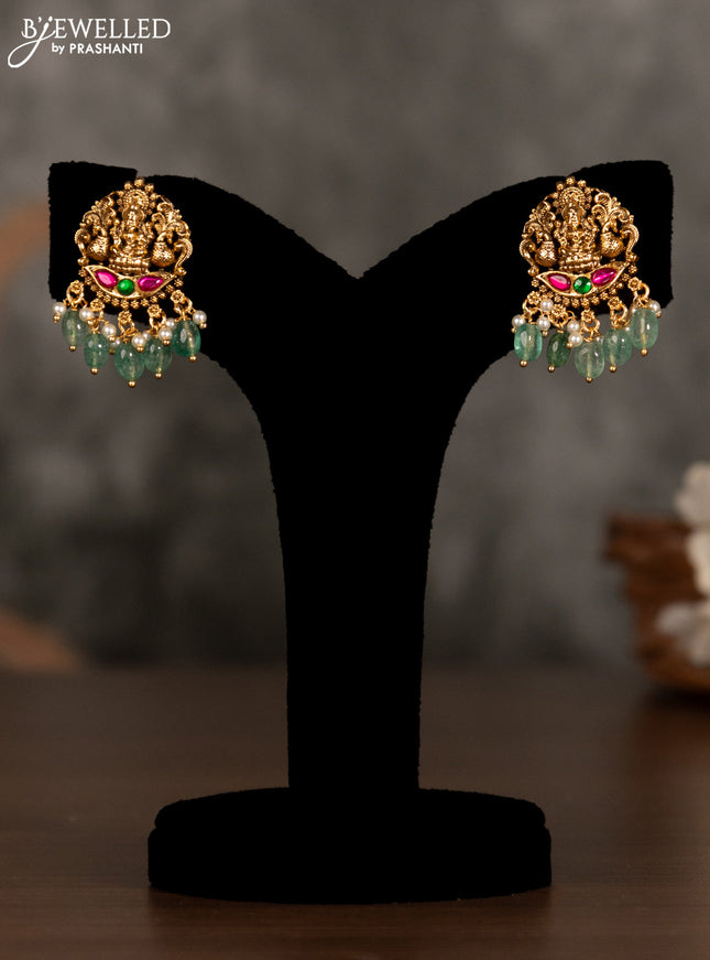 Antique pendant set lakshmi design with kemp stones and green beads hanging