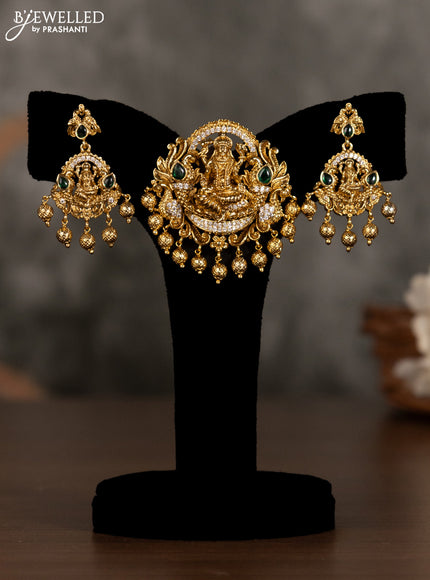 Antique pendant set lakshmi design with green kemp & cz stones and golden beads hanging