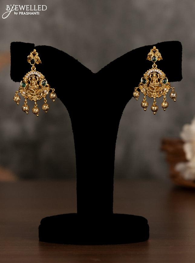 Antique pendant set lakshmi design with green kemp & cz stones and golden beads hanging