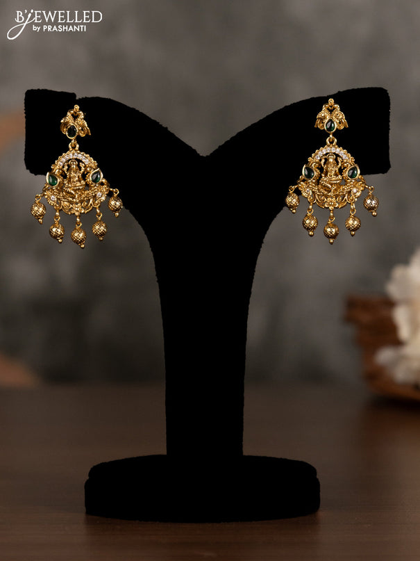 Antique pendant set lakshmi design with green kemp & cz stones and golden beads hanging