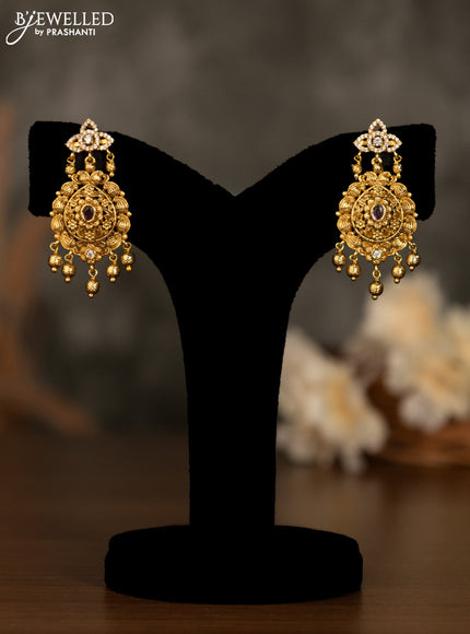 Antique pendant set with pink kemp & cz stones and golden beads hanging