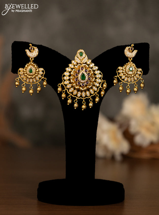 Antique pendant set with kemp & cz stones and golden beads hanging