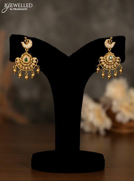 Antique pendant set with kemp & cz stones and golden beads hanging