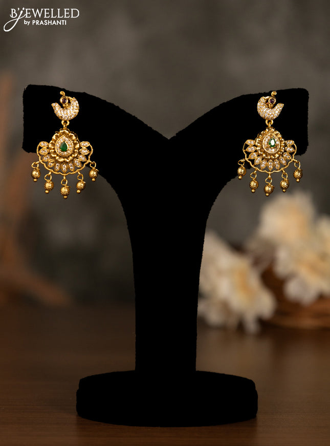 Antique pendant set with kemp & cz stones and golden beads hanging