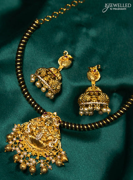 Antique ring type choker kemp & cz stones with lakshmi pendant and golden beads hanging