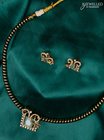 Antique ring type choker with mint green and cz stones pendant
