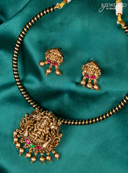 Antique ring type choker kemp stones with lakshmi pendant and golden beads hanging