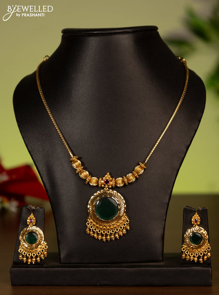 Antique attigai necklace with kemp stones and golden beads hanging