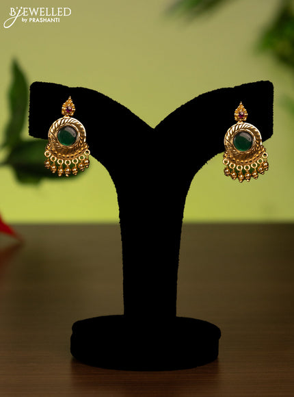 Antique attigai necklace with kemp stones and golden beads hanging