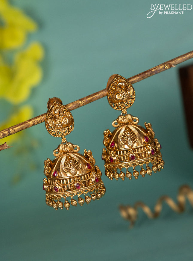 Antique jhumka peacock design with pink kemp stones and golden beads hanging