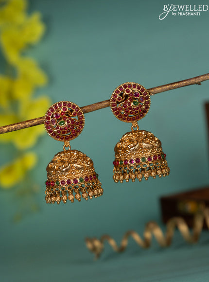 Antique jhumka peacock design with kemp stones and golden beads hanging
