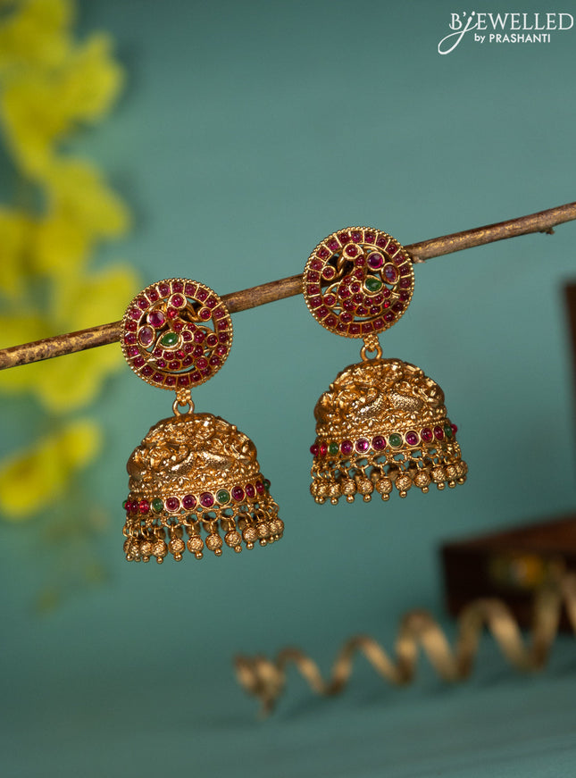 Antique jhumka peacock design with kemp stones and golden beads hanging