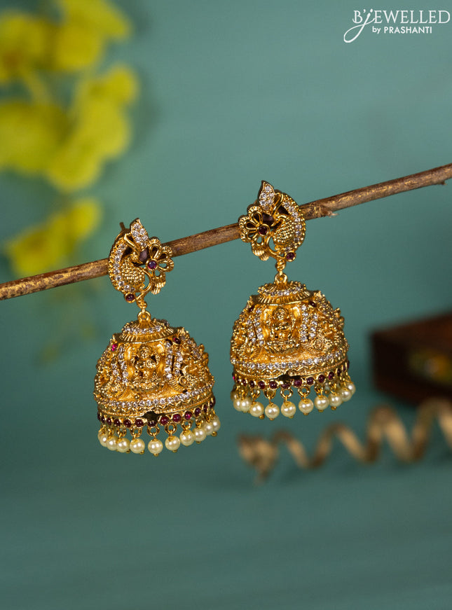 Antique jhumka lakshmi design with pink kemp & cz stones and pearl hangings