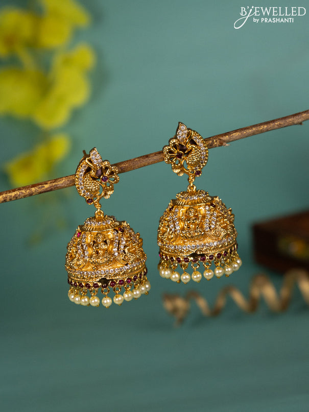 Antique jhumka lakshmi design with pink kemp & cz stones and pearl hangings