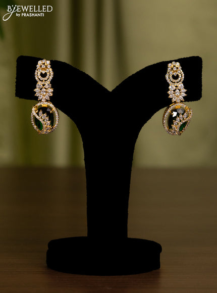 Zircon earrings with emerald and cz stones in gold finish