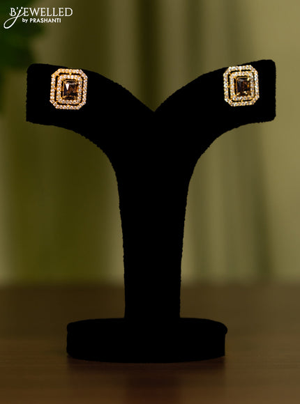 Zircon earrings with violet and cz stones in gold finish