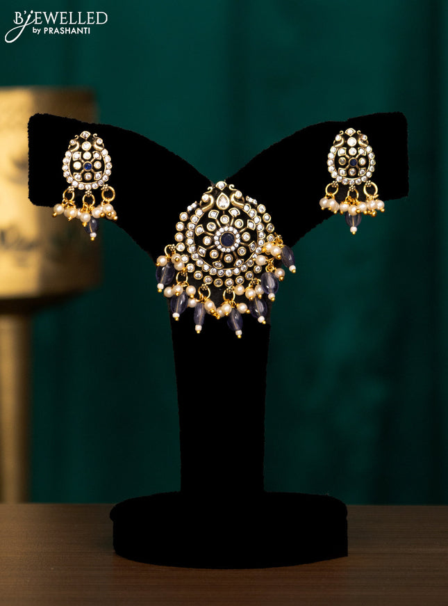 Pendant set with violet & cz stones and beads hanging in victorian finish