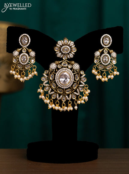 Pendant set elephant design with cz stones and beads hanging in victorian finish