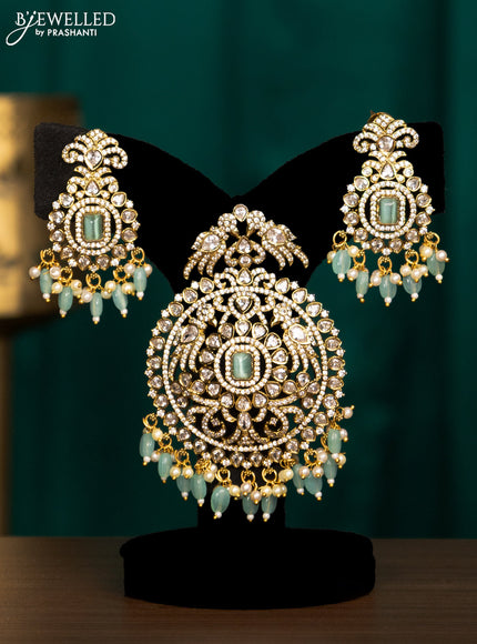 Pendant set with mint green & cz stones and beads hanging in victorian finish