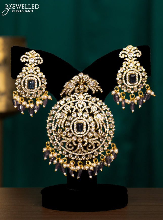 Pendant set with sapphire & cz stones and beads hanging in victorian finish