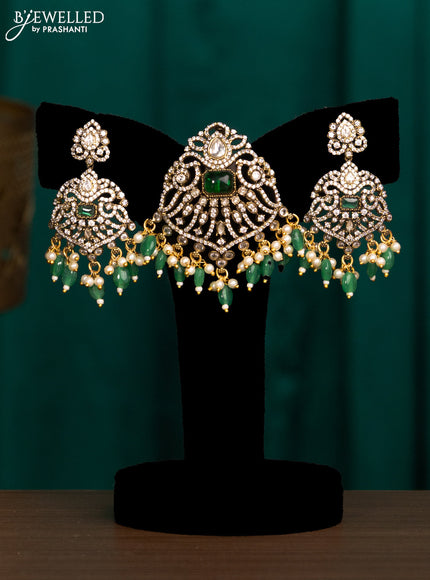 Pendant set with emerald & cz stones and beads hanging in victorian finish