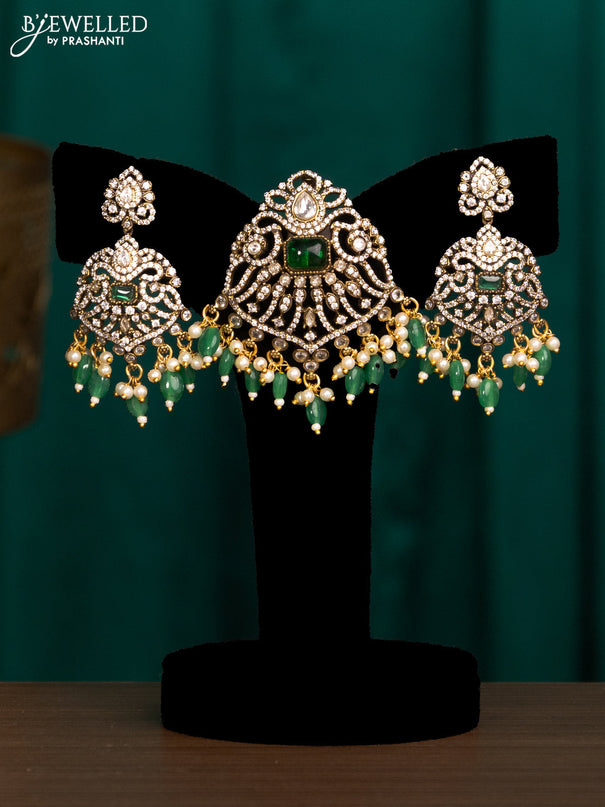 Pendant set with emerald & cz stones and beads hanging in victorian finish
