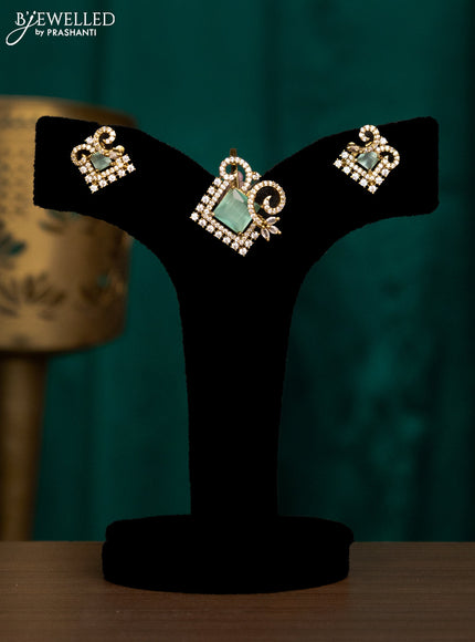 Pendant set with mint green and cz stones in victorian finish