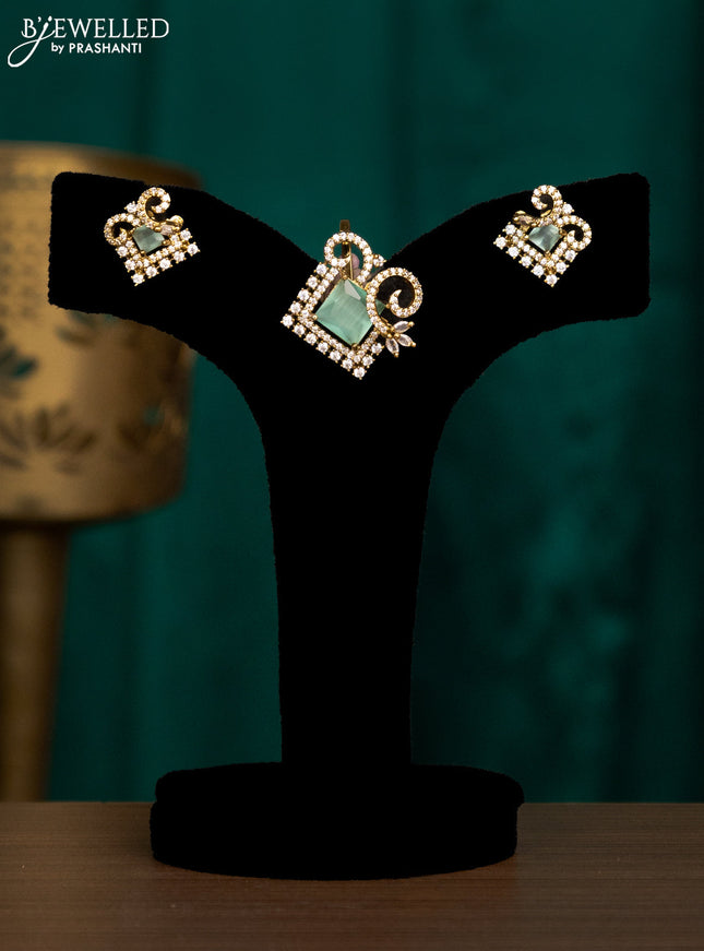 Pendant set with mint green and cz stones in victorian finish