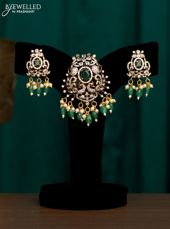 Pendant set with emerald & cz stones and beads hanging in victorian finish