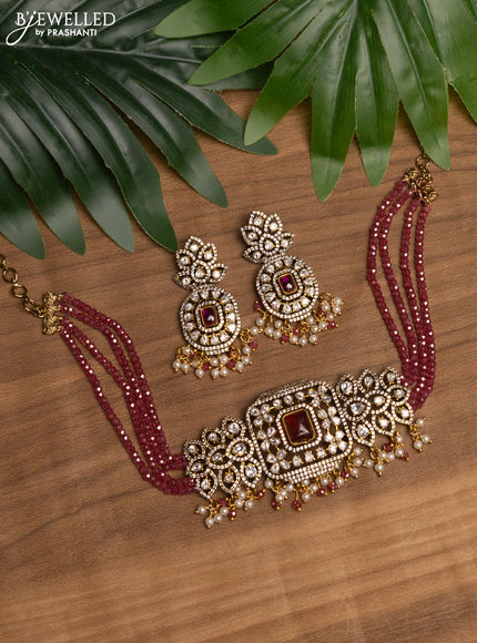 Beaded maroon choker with ruby & kundan stones and beads hanging in victorian finish