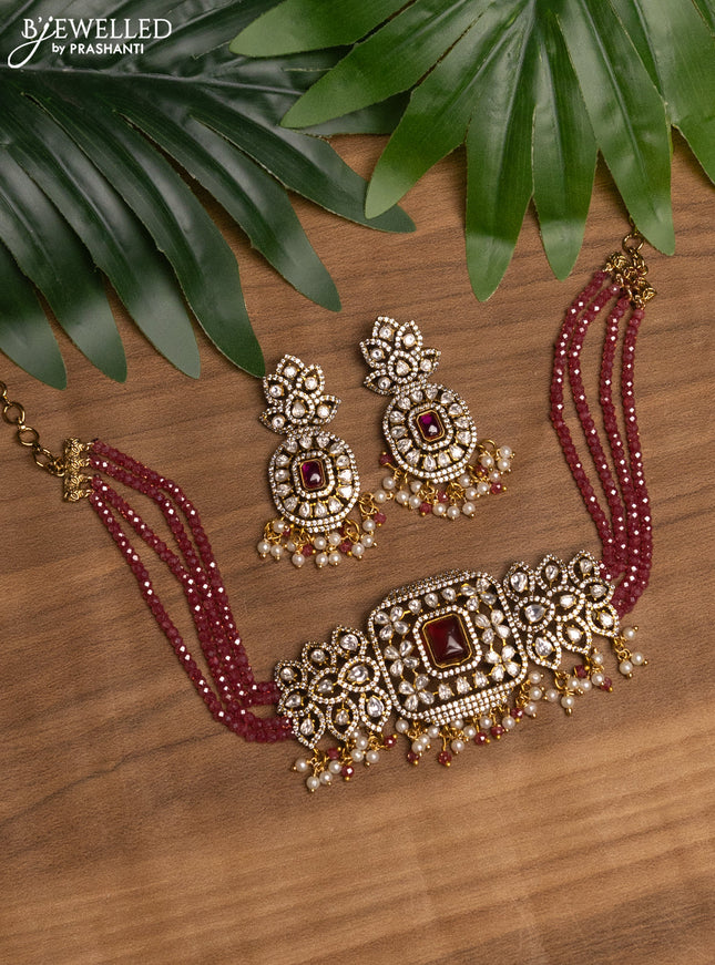 Beaded maroon choker with ruby & kundan stones and beads hanging in victorian finish