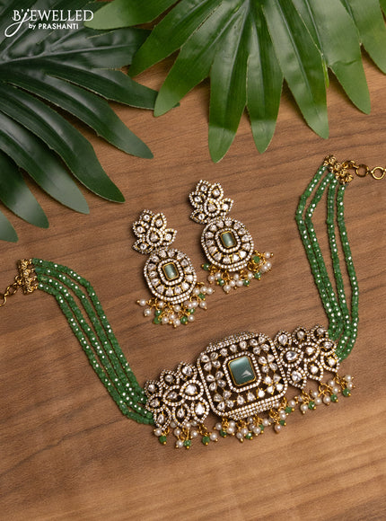 Beaded mint green choker with mint green & kundan stones and beads hanging in victorian finish