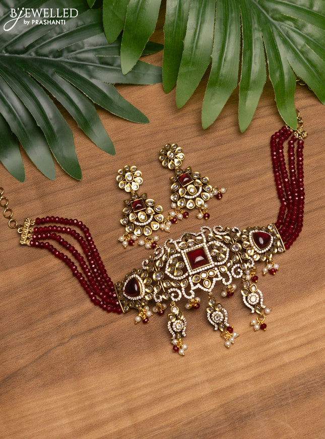 Beaded maroon choker with ruby & cz stones and beads hanging in victorian finish