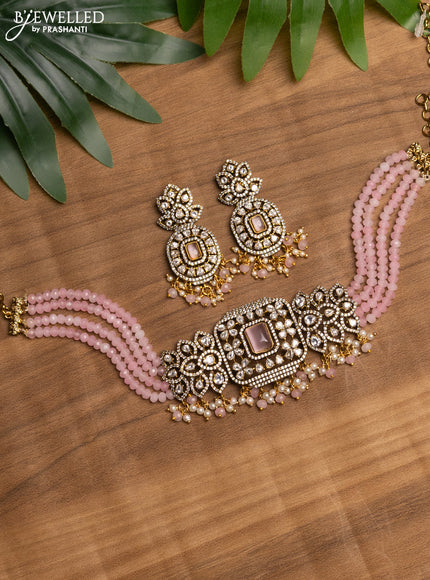 Beaded baby pink choker with baby pink & kundan stones and beads hanging in victorian finish